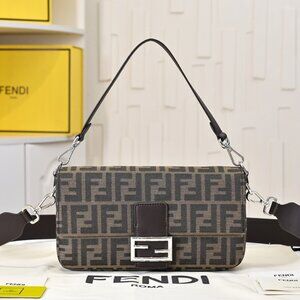 Vintage Fendi baguette shoulder bag with silver hardware buckle.